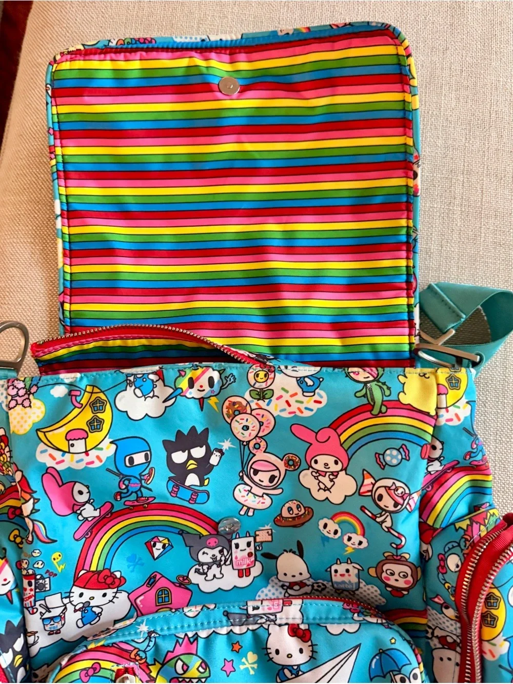 tokidoki x Hello Sanrio for JujuBe Baby Backpack - Bright Blue Rainbow Print